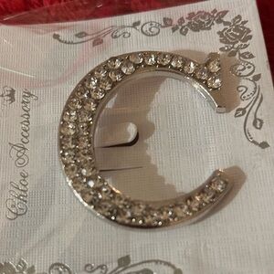 Elegant rhinestone letter “C” brooch in sliver tone